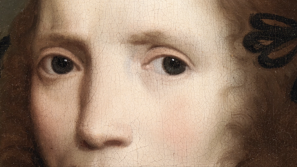 Closeup of a painting of the eyes of a 17th C young European woman